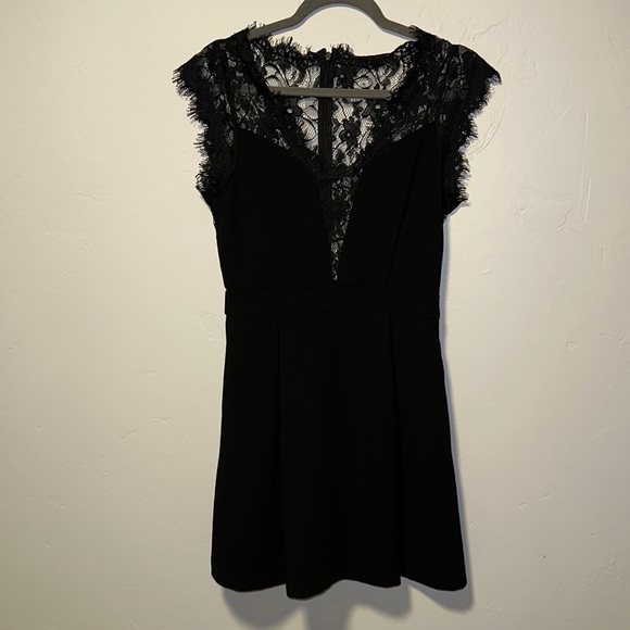 Dresses & Skirts - Lacy Black Dress So Cute!